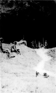 Photograph: By courtesy of W.D. Boyce. At the Entrance of the Great Cave